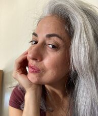 Book an Appointment with Nahla Forward for Thai Yoga