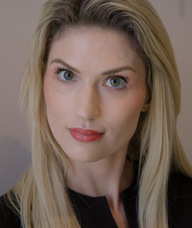 Book an Appointment with Cait Chesky for Golden glo® Spray Tanning